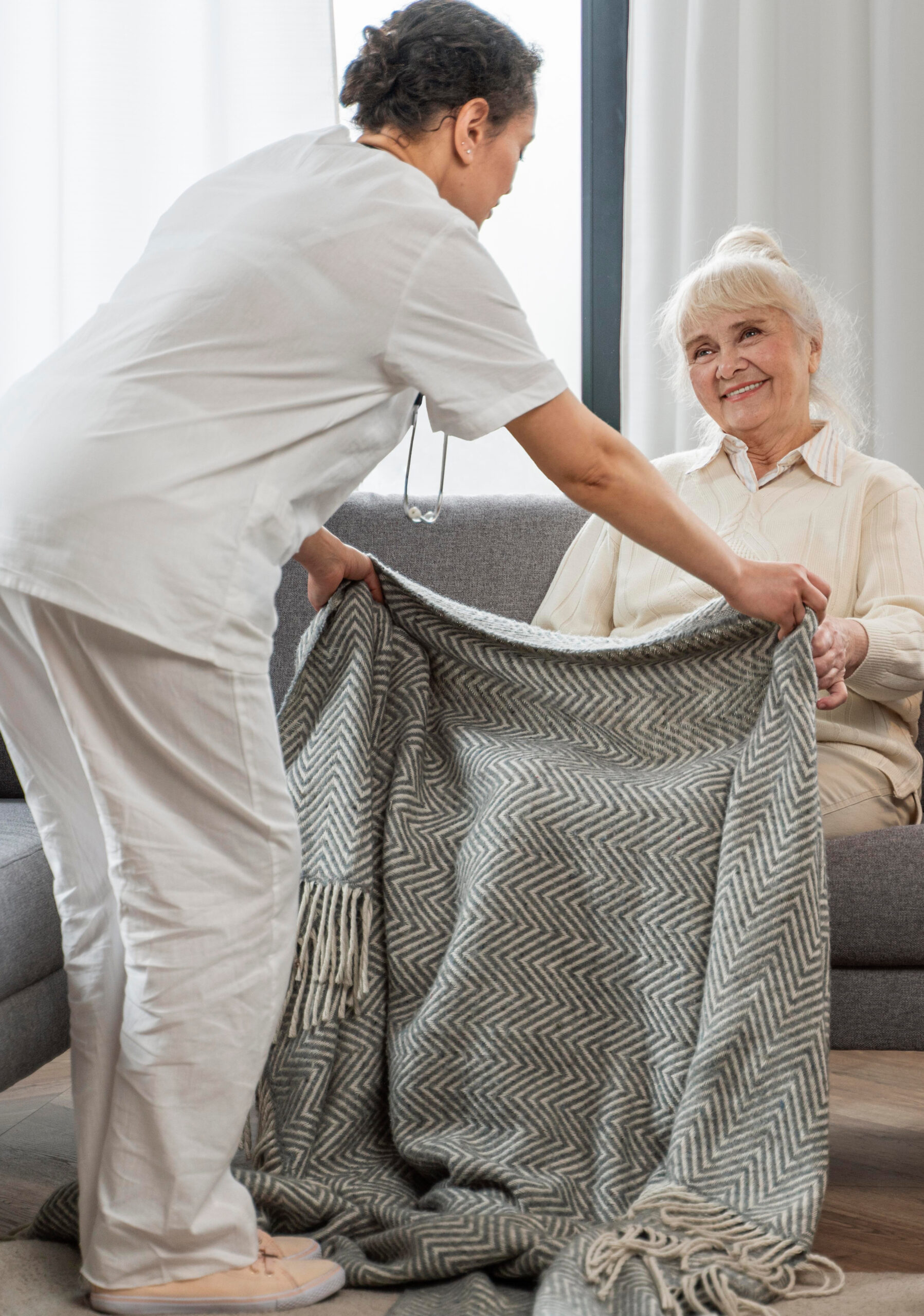 doctor-taking-care-senior-woman-home (1)